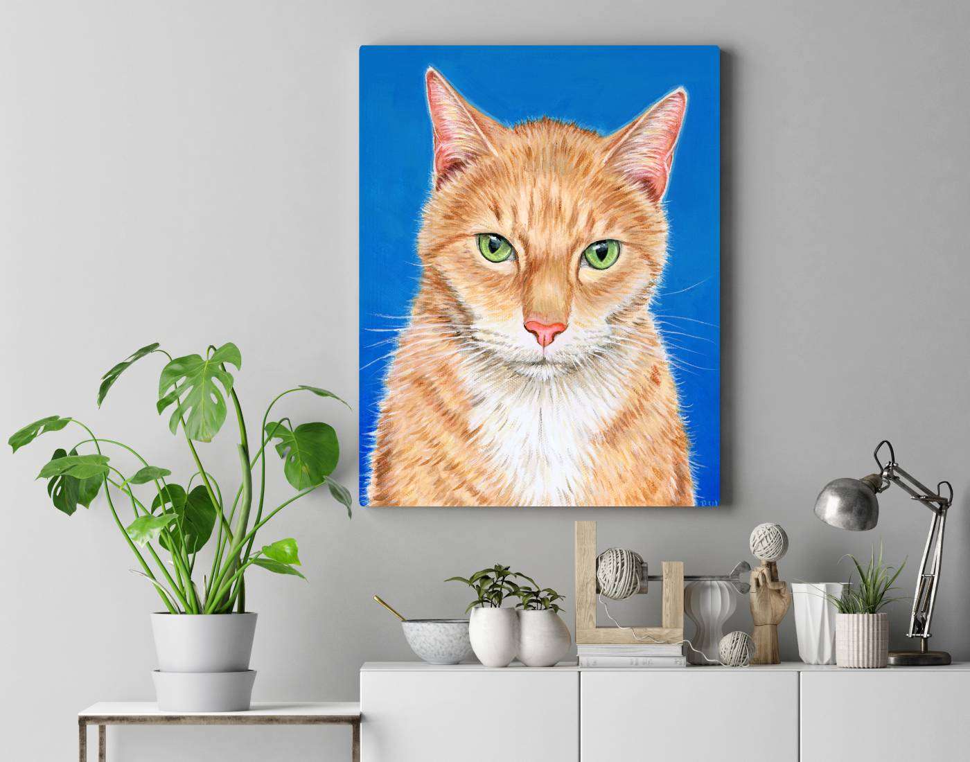 A portrait of an orange tabby cat named Ace.