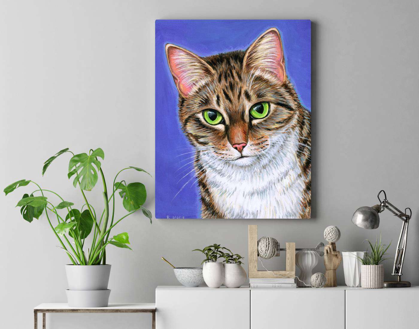 A colorful pet portrait of a brown and white tabby cat named Aspen.